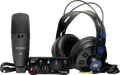 Audio equipment set with microphone, audio interface, and headphones on a white background