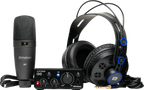 Audio equipment set with microphone, audio interface, and headphones on a white background