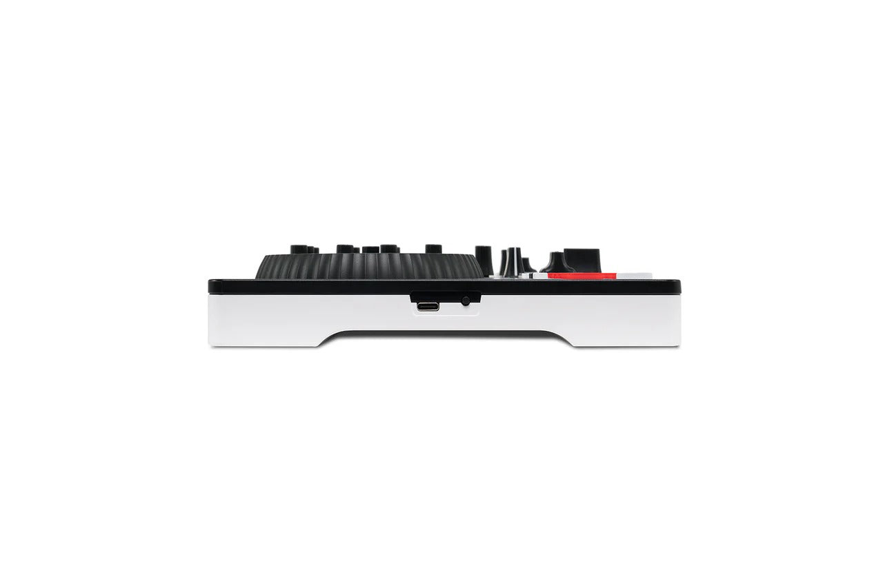 Numark DJ controller rear edge view with top knobs and compact control layout