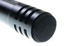 Black wireless vocal microphone with mesh grille and ribbed accents