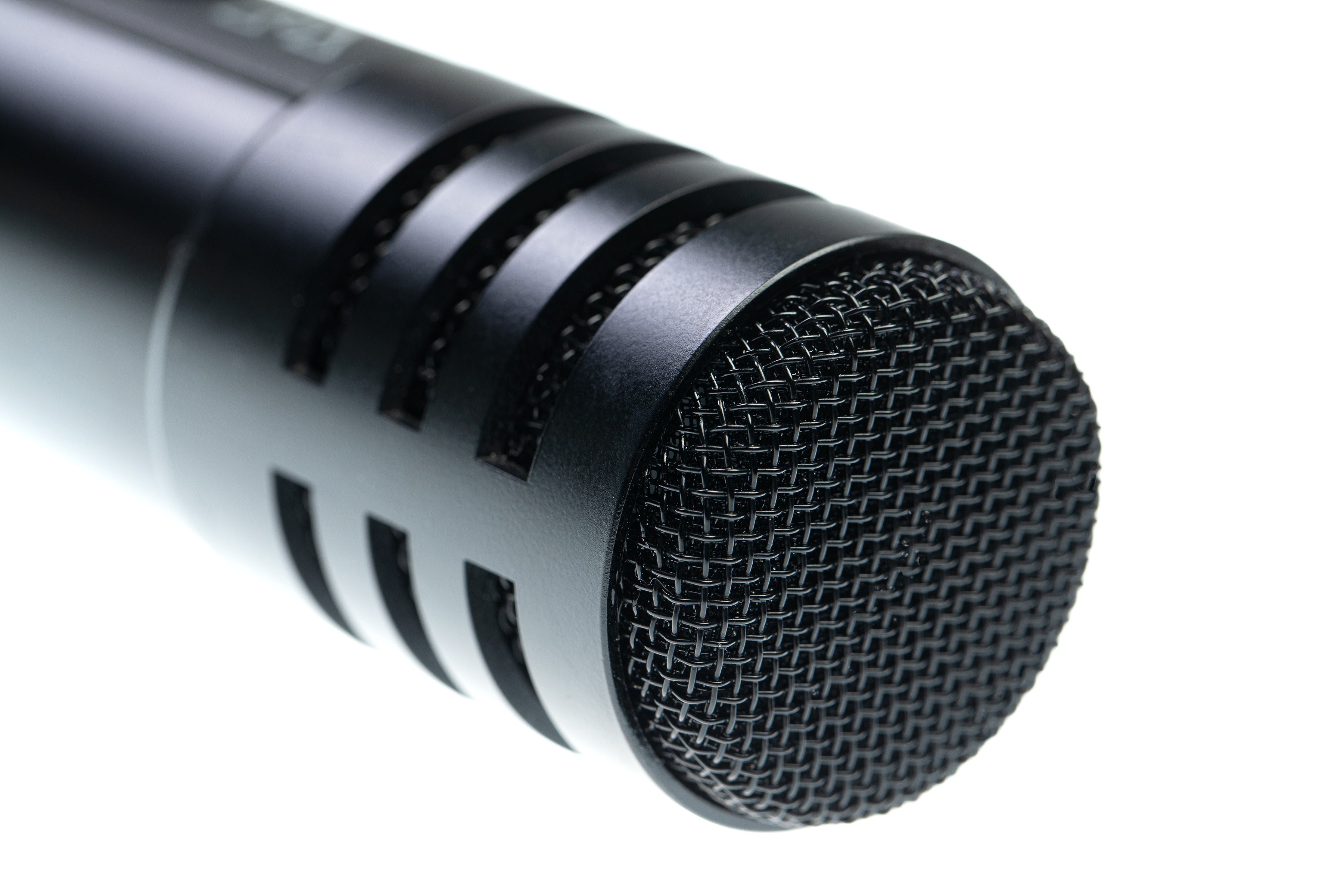 Black wireless vocal microphone with mesh grille and ribbed accents