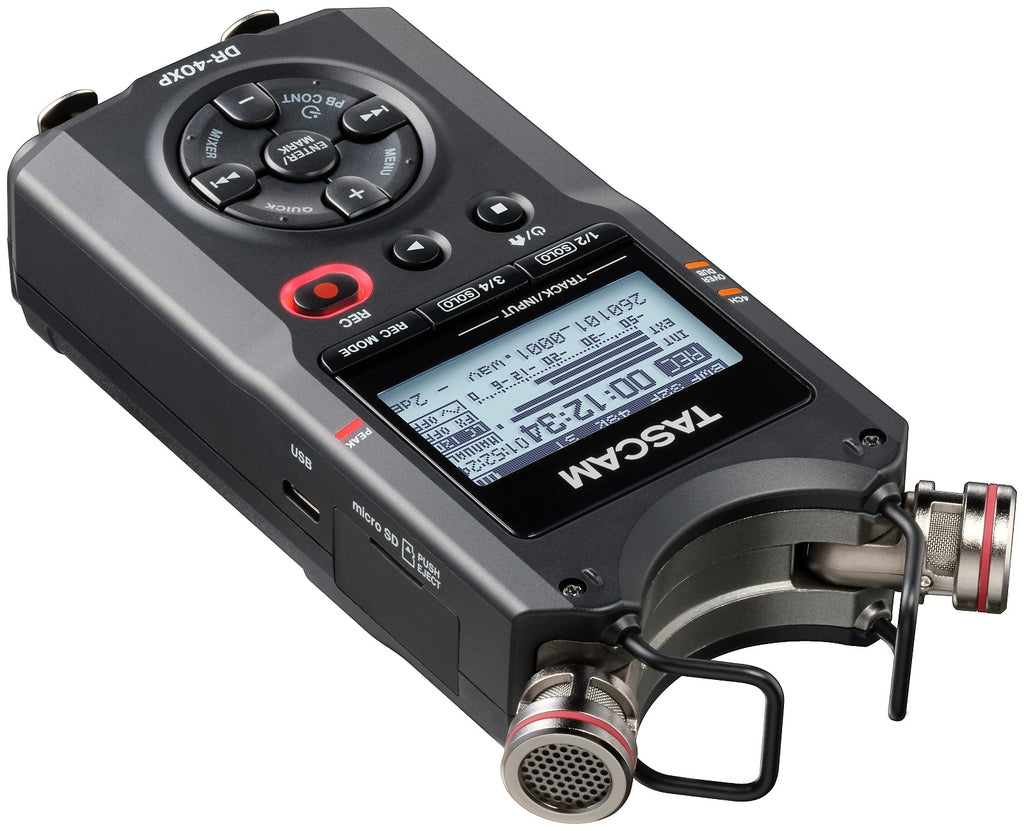 Portable recorder top view with LCD screen, control buttons, and dual mic capsules, dark gray.