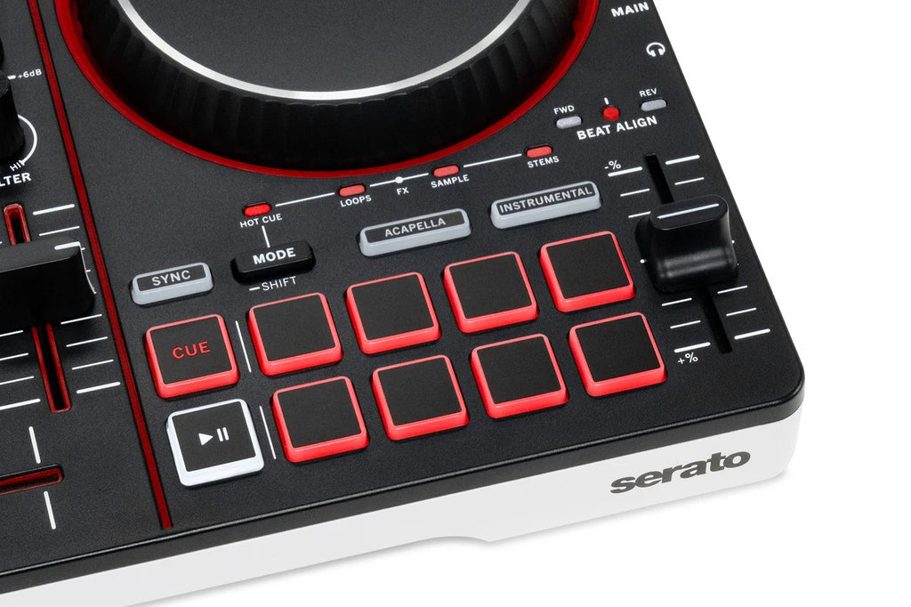 Numark DJ controller close-up of red cue pads, knobs, and illuminated control buttons