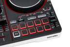 Numark DJ controller close-up of red cue pads, knobs, and illuminated control buttons