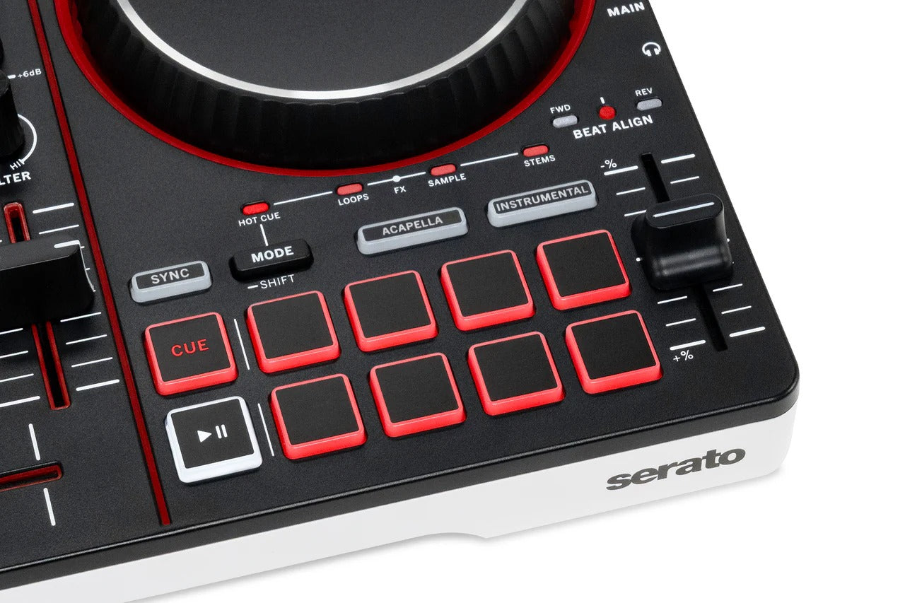 Numark DJ controller close-up of red cue pads, knobs, and illuminated control buttons